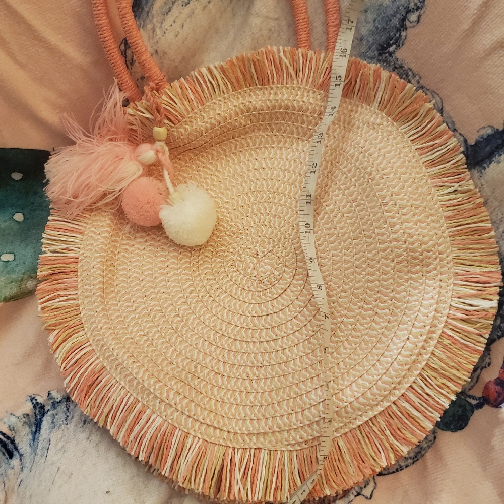Saw this round  pink coral circular summer bag fun